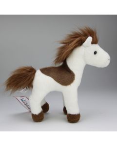 weißes kleines Plüschtier Pferd mit braunen Schecken