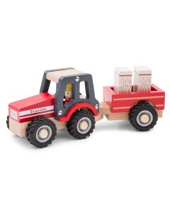 roter Holzspielzeuge-Traktor mit Hänger und Ladung