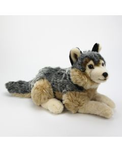 liegender Plüschtier Grauwolf